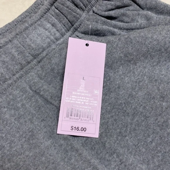 Grey shorts size l tee shirt material. $6 each. I have 24 of them - Picture 3 of 4